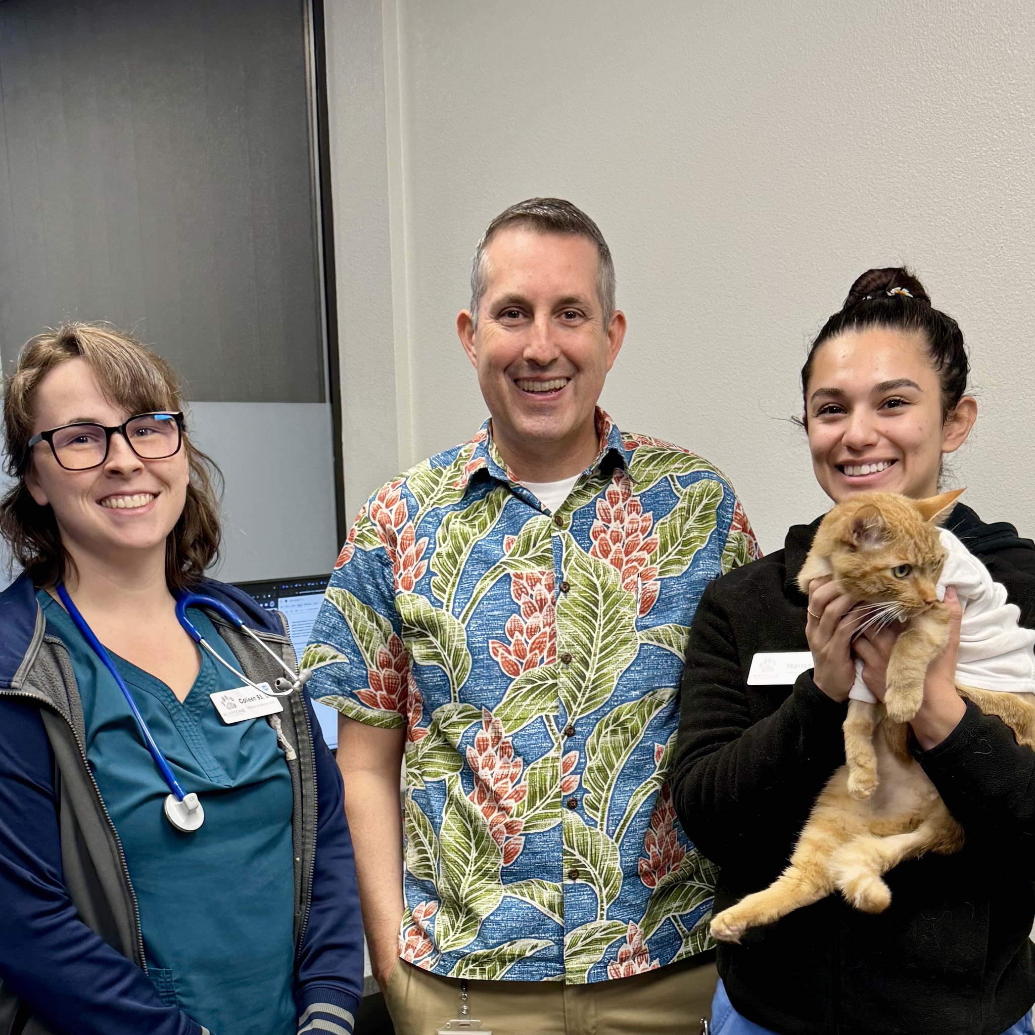 Azrael with his medical team at Sunstone - from left to right: Colleen (veterinary technician), Dr. Joshua Elliott (internal medicine specialist), Marissa (veterinary assistant)